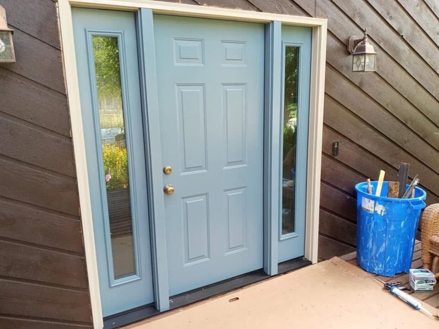 New exterior door with sidelights, painted slate blue